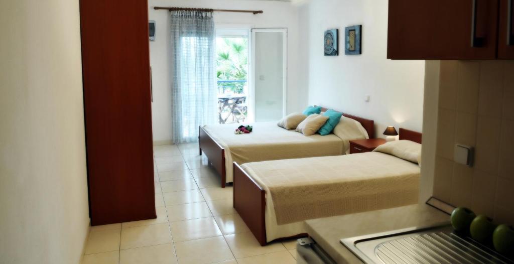 Asterias Hotel Pórto Kufó Szoba fotó