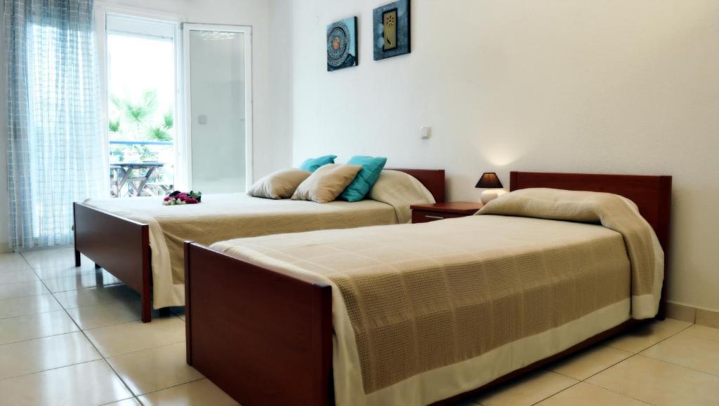Asterias Hotel Pórto Kufó Szoba fotó
